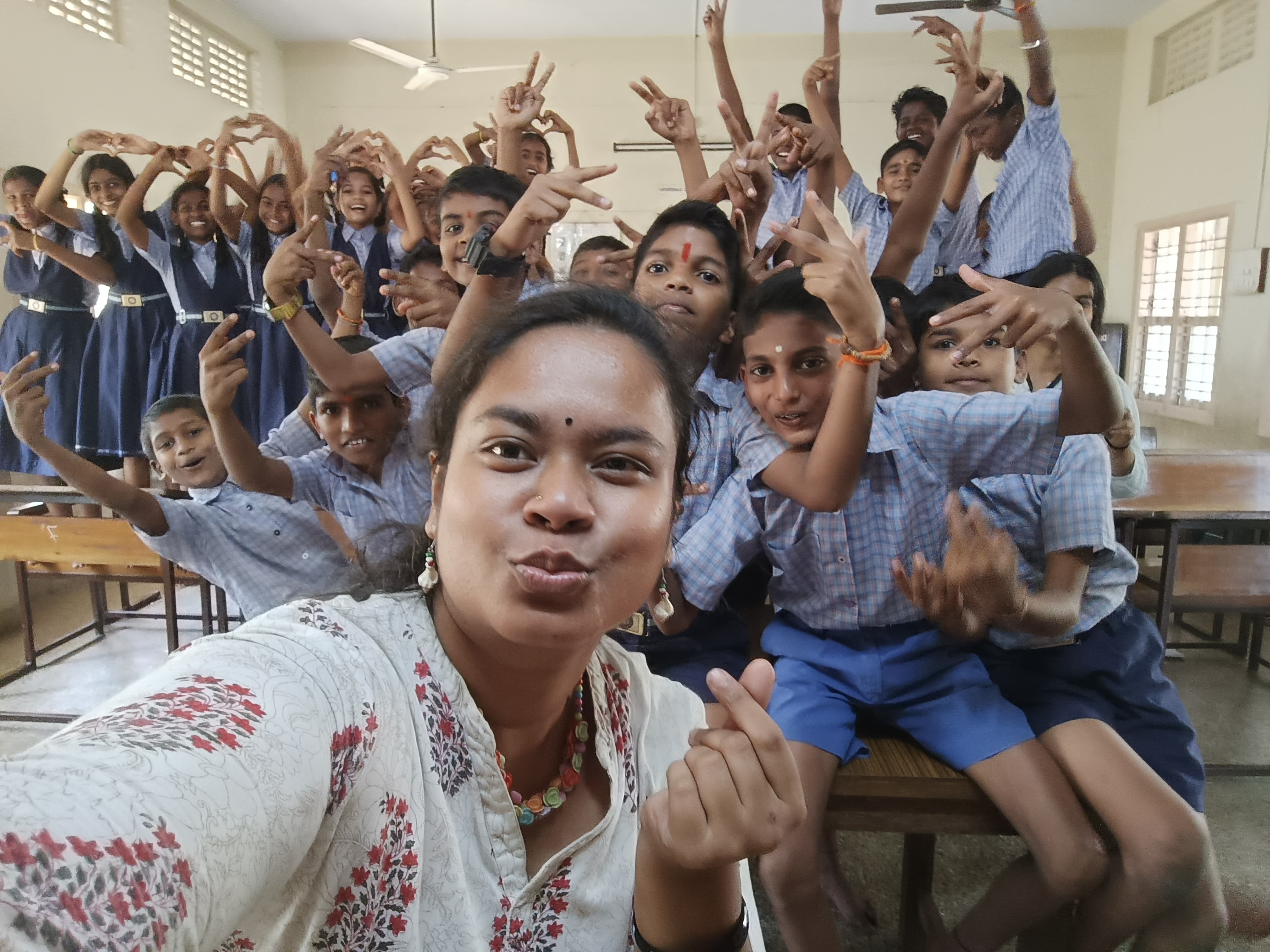 One of our volunteers with the students