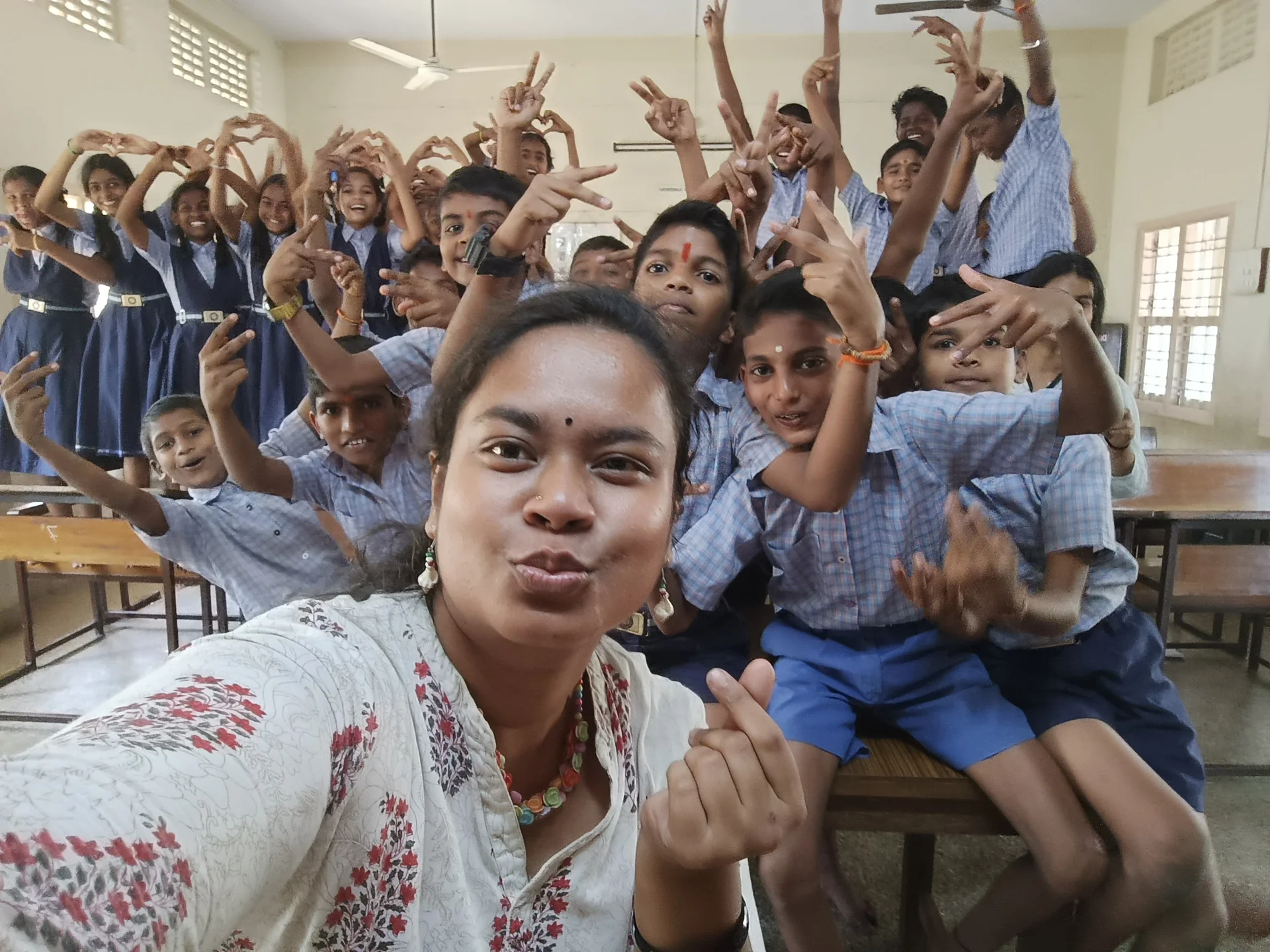 One of our volunteers with the students